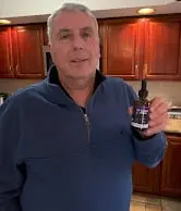 Customer with Yu Sleep bottle